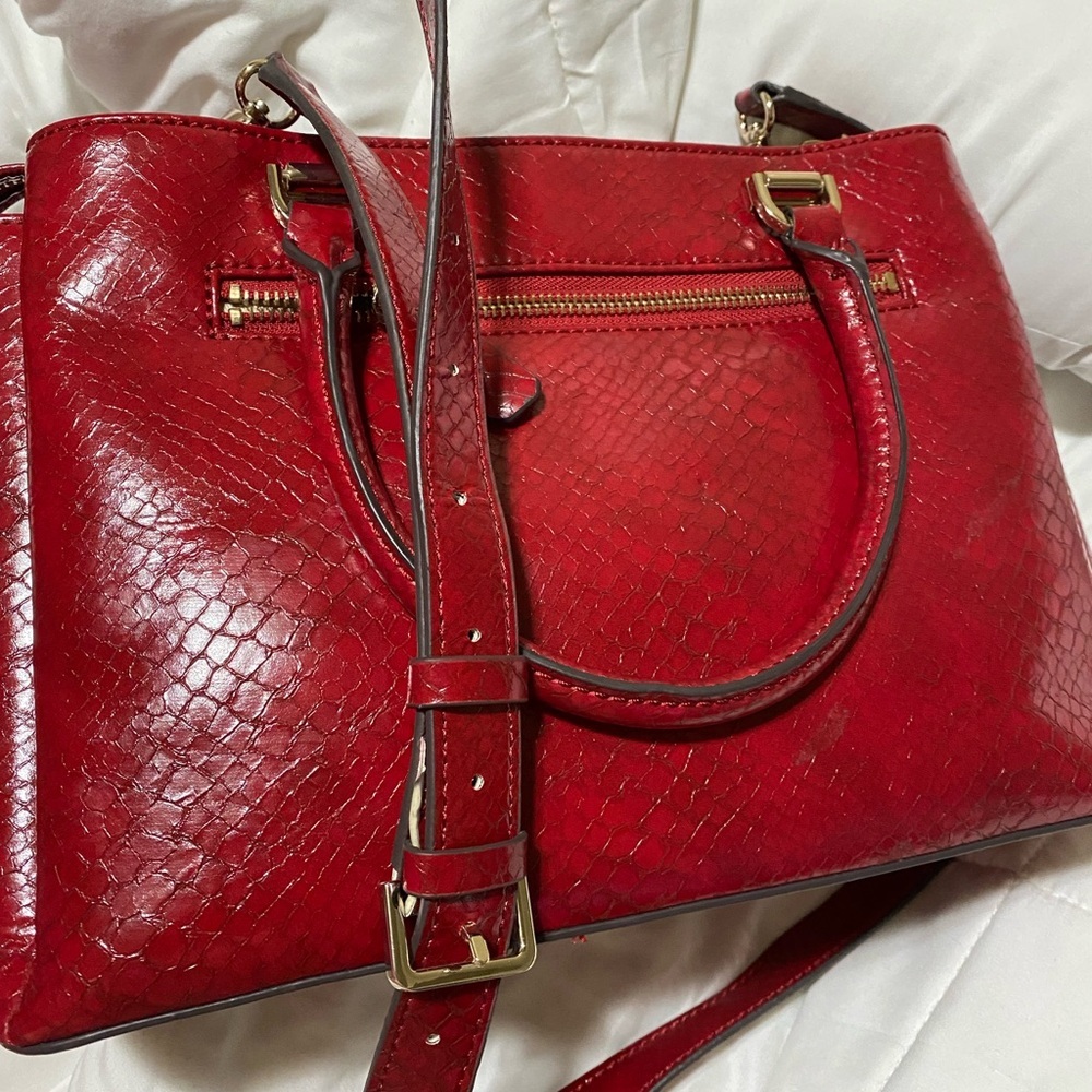 Guess bag red color % Pu Lining/ 80% Polyester 20% Cotton